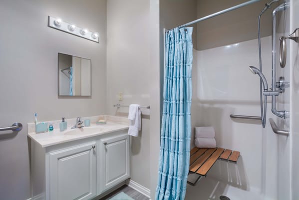 Bathroom with a shower and sink area