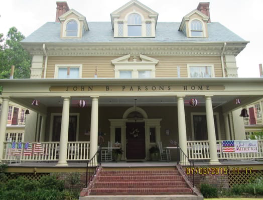 Front entrance of John B. Parsons Assisted Living Community decorated for Independence Day.