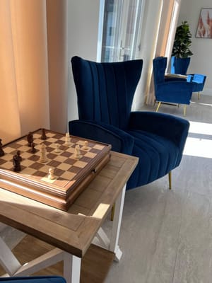Interior view of a common area with chess table