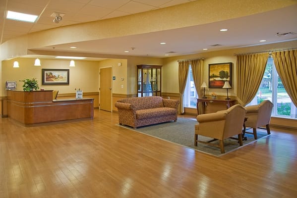 Bright lobby area with seating and large windows