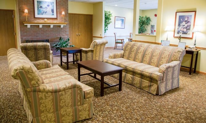 Seating area with sofa and coffee table in a well-lit living room
