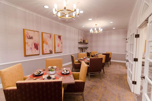 Elegant dining room setup with chairs and tables at MorningStar Senior Living