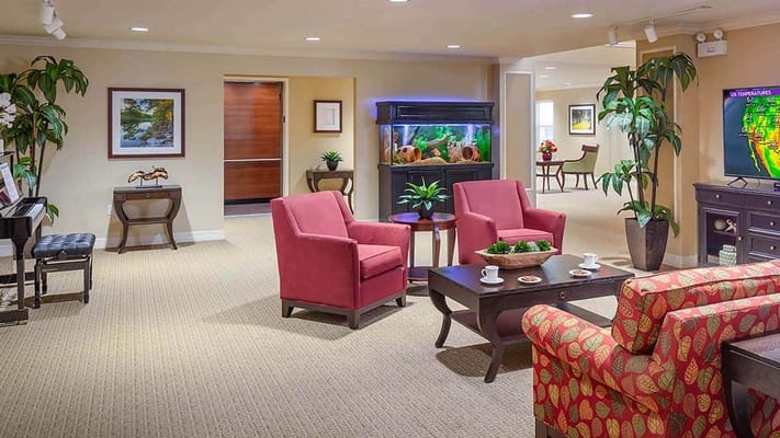 Interior common area with seating and fish tank