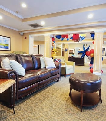Common area with a couch and festive decorations