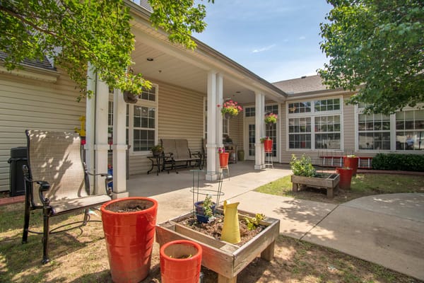 Outdoor space with seating and flower pots