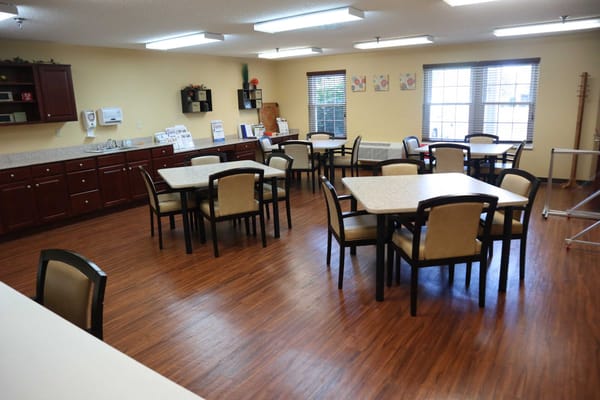 Interior view of the dining room with tables and chairs