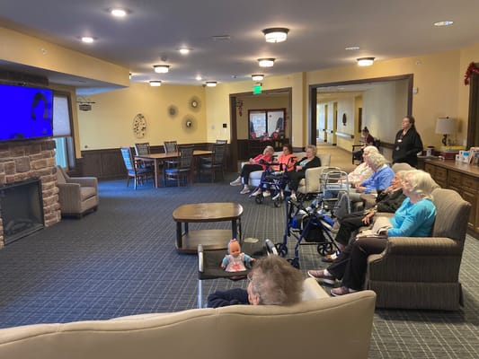 Residents watching TV in a common area