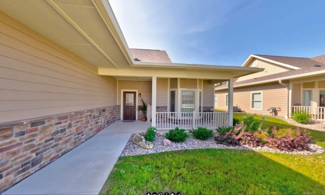 Exterior view of a senior living facility entrance