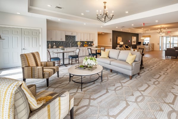 Bright common area with comfortable seating and decor