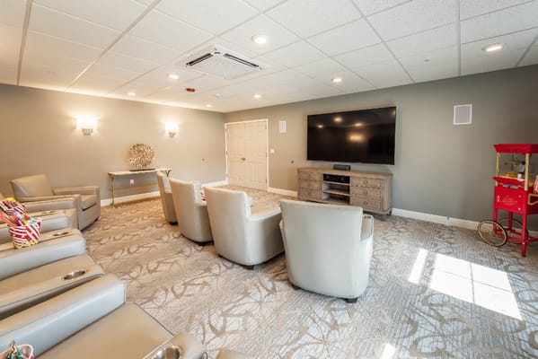 Common area with comfortable seating and television