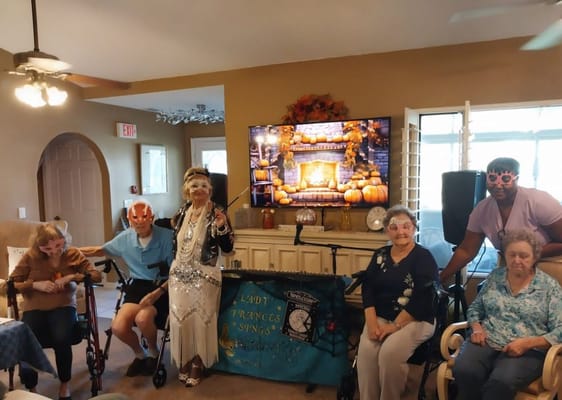 Residents enjoying a performance at Riverside Care Center.