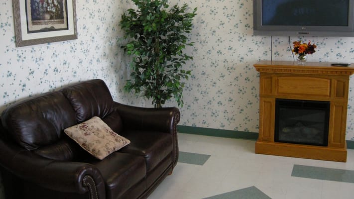 Cozy seating area with a couch and potted plant