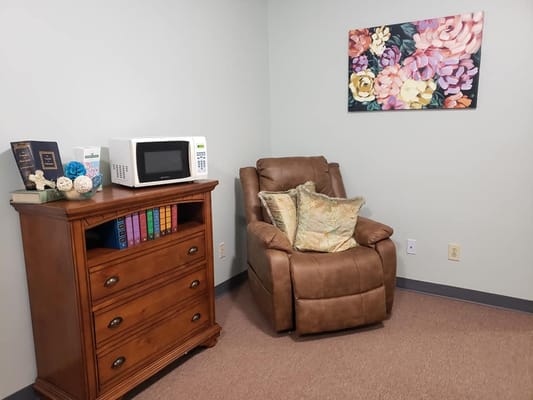 Cozy corner in a resident room with floral decor
