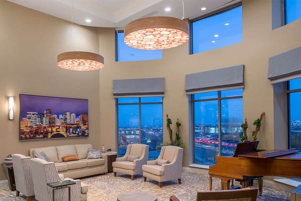 Interior lounge area with seating and piano