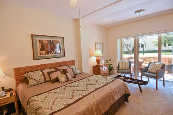 Cozy resident room with a bed and seating area