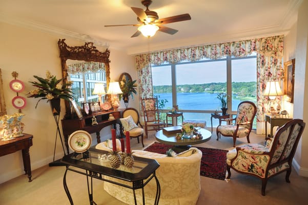 Bright common area with elegant seating and lake view