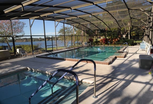 Indoor pool area with a view of the lake