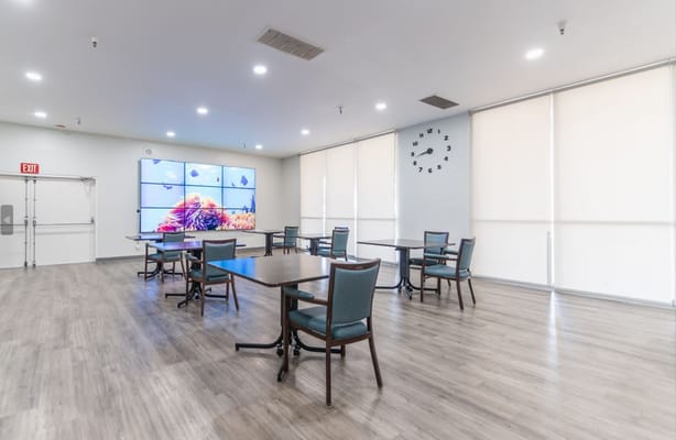 Interior common area with tables and chairs