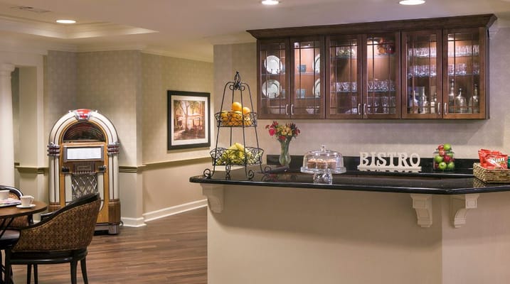 Interior view of a bistro area with food and decor