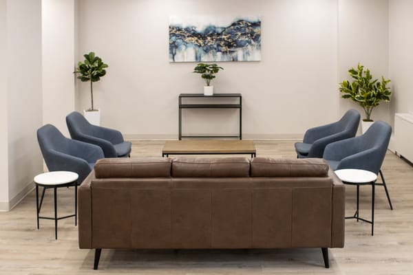 Common area with seating and plants in a modern design