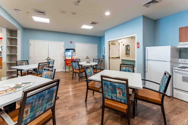 Bright dining room with tables and chairs