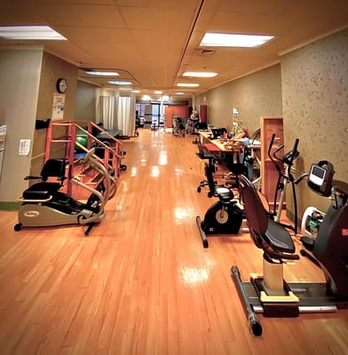 Interior view of a fitness area with exercise equipment