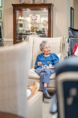 Resident enjoying snack in a common area