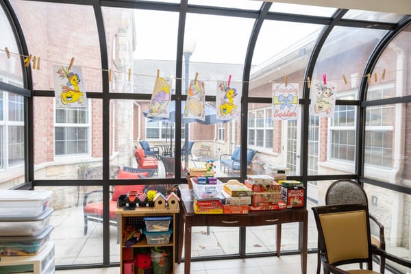 Activity area with crafts displayed on a clothesline