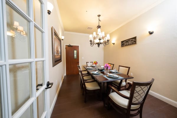 Elegant dining area with a large table and chairs