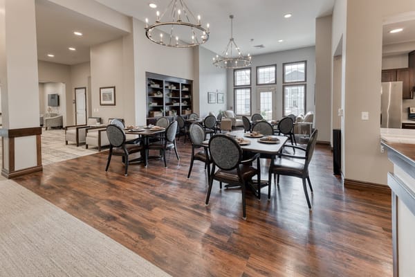 Bright dining room with tables and chairs