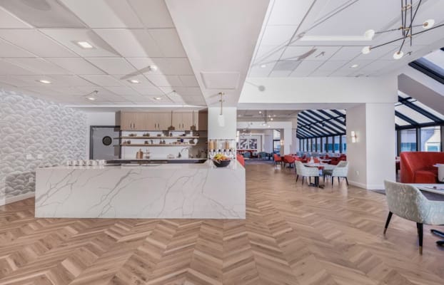 Bright common area with seating and modern decor