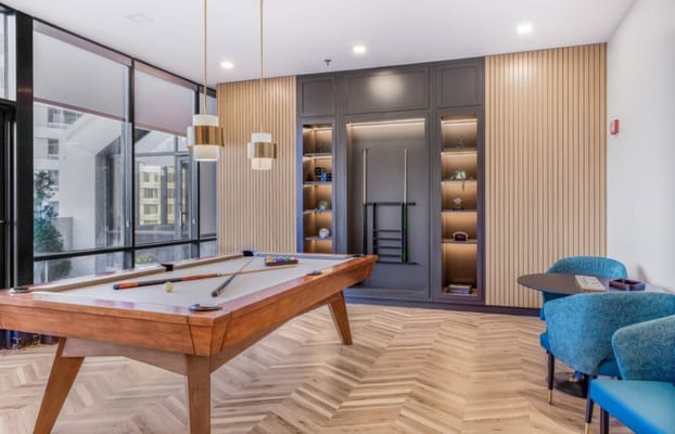 Interior common area with a billiard table
