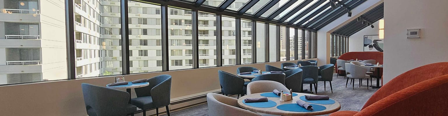 Dining area with natural light and modern decor