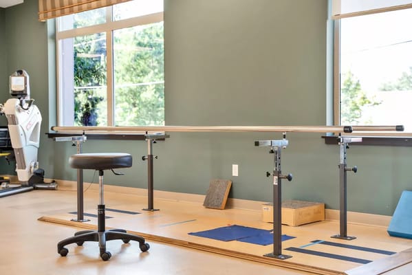 Rehabilitation therapy equipment in a room