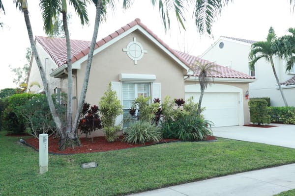 Exterior view of a well-maintained assisted living facility
