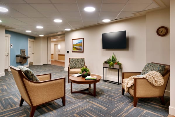 Cozy common area with seating and plants