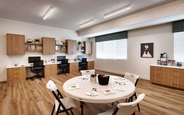 Bright activity room with tables and chairs