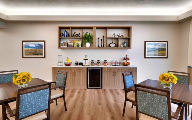Bright dining area with floral centerpieces