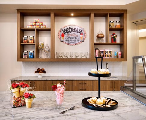 Dessert display with ice cream and pastries