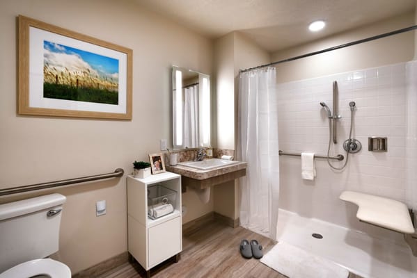 Brightly lit bathroom with modern amenities