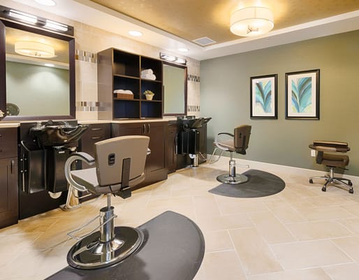 Well-lit salon area with elegant design for residents