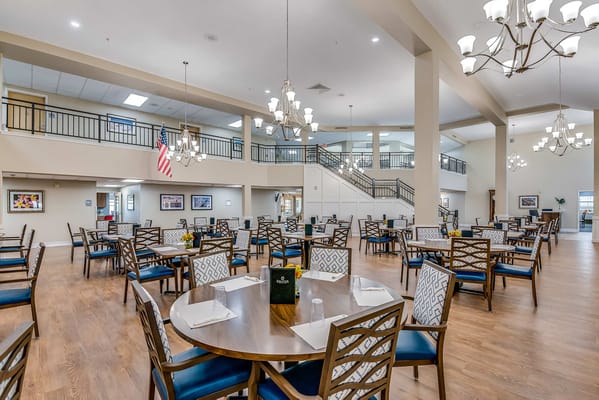 Dining room with tables and chairs in a spacious area