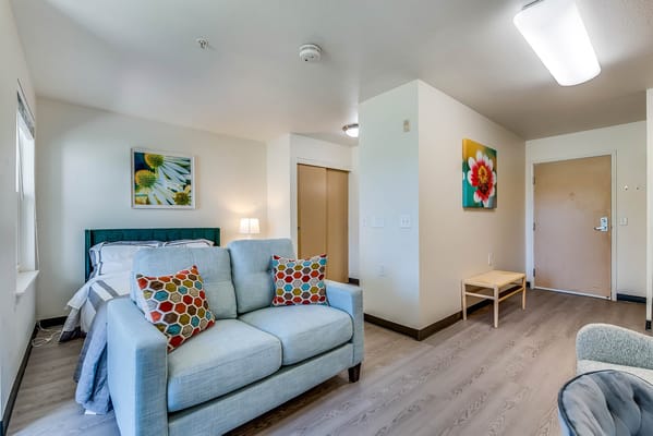 Cozy resident room with modern decor and furnishings