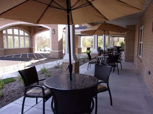 Outdoor seating area with umbrellas and tables