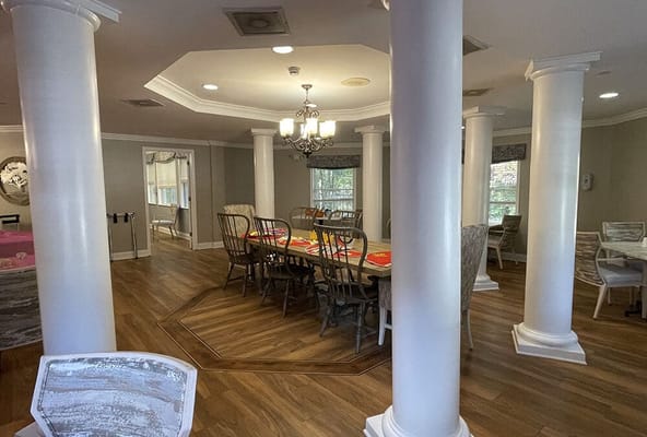 Common area with dining table and chairs
