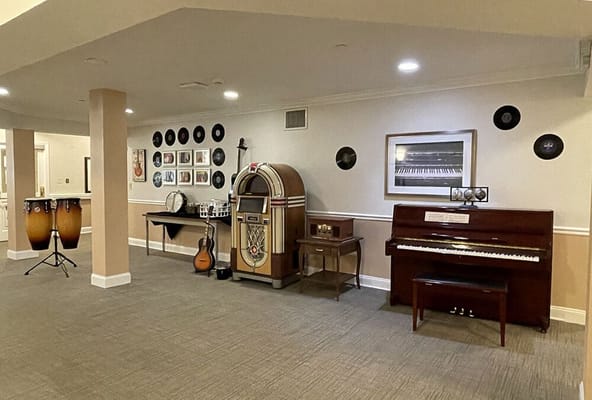 Interior common area with a jukebox and musical instruments
