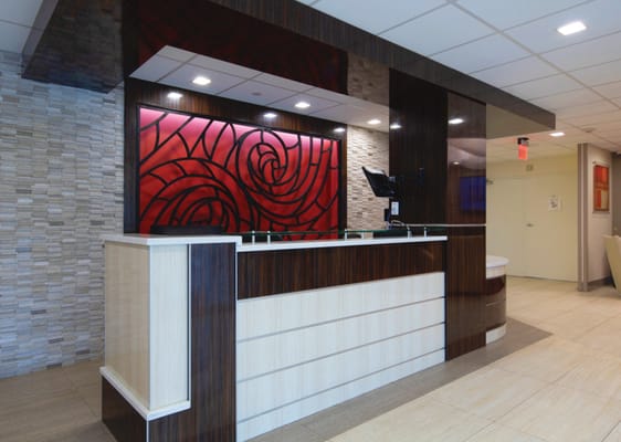 Reception area with a modern design and warm lighting