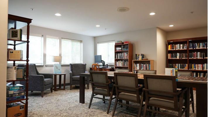 Bright, inviting reading area with shelves and seating