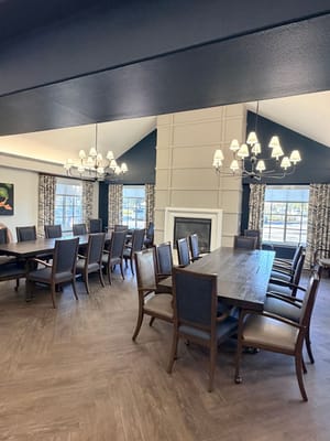 Bright dining area with large tables and chairs