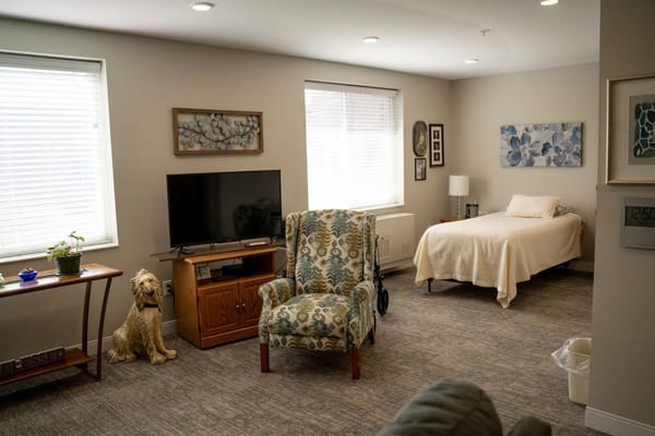 Cozy interior room with a bed and seating area